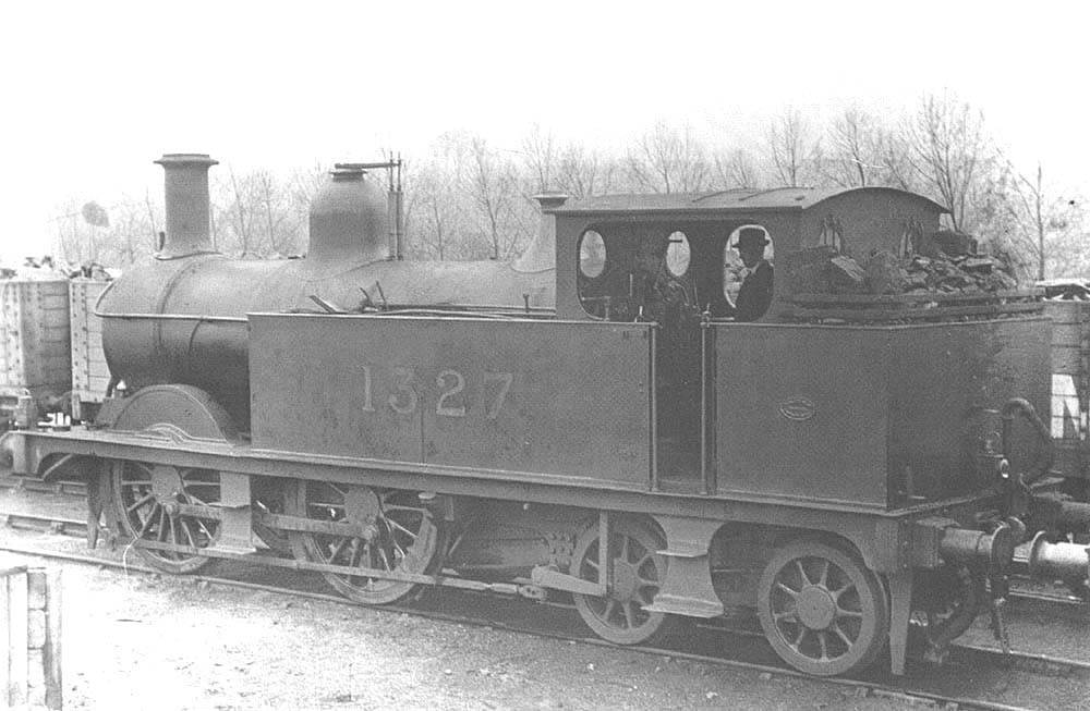 MR 1P 0-4-4T 1532 class No 1327 is seen standing 'cold' at the rear of the coaling stage on 9th April 1922