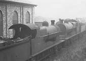 Ex-LNWR 4-6-0 No 8786, in store with other engines of the same type, beside the shed on 2nd March 1935