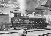 Ex-MR 2F Kirtley 0-6-0 No 22853, another of Bournville's Victorian veterans, stands inside the shed on 9th May 1936