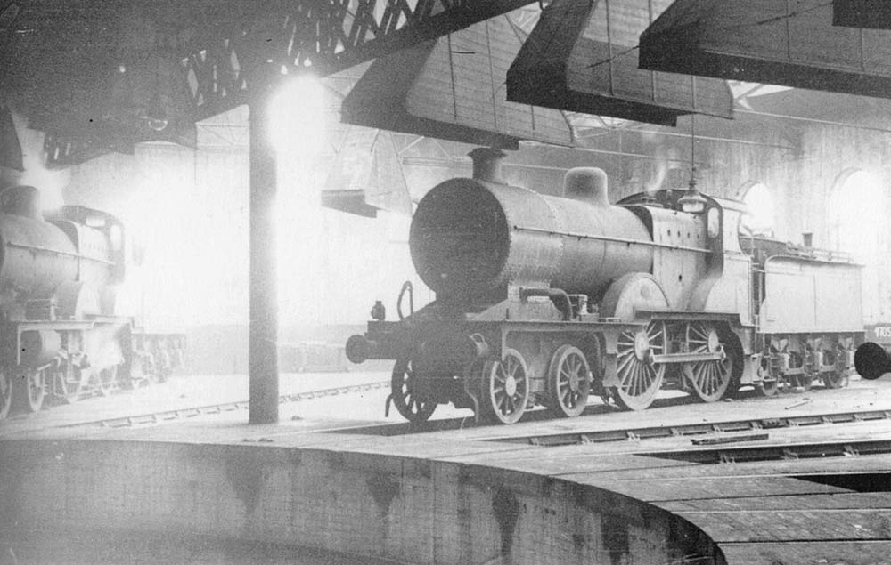 An unidentified ex-MR 2P 4-4-0 483 class locomotive stands in steam inside Bournville shed on 24th Sept 1950