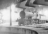 An unidentified ex-MR 2P 4-4-0 483 class locomotive stands in steam inside Bournville shed on 24th Sept 1950