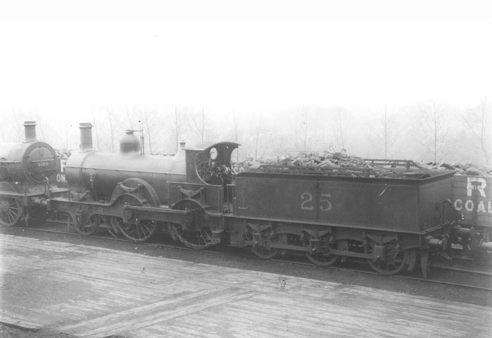 Midland Railway class 1 2-4-0 No 25, clearly still in use, photographed at Bournville on Sunday 9th April 1922