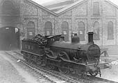 LMSR 1P 2-4-0 No 20002 photographed near the shed entrance at Bournville on Saturday 2nd March 1935