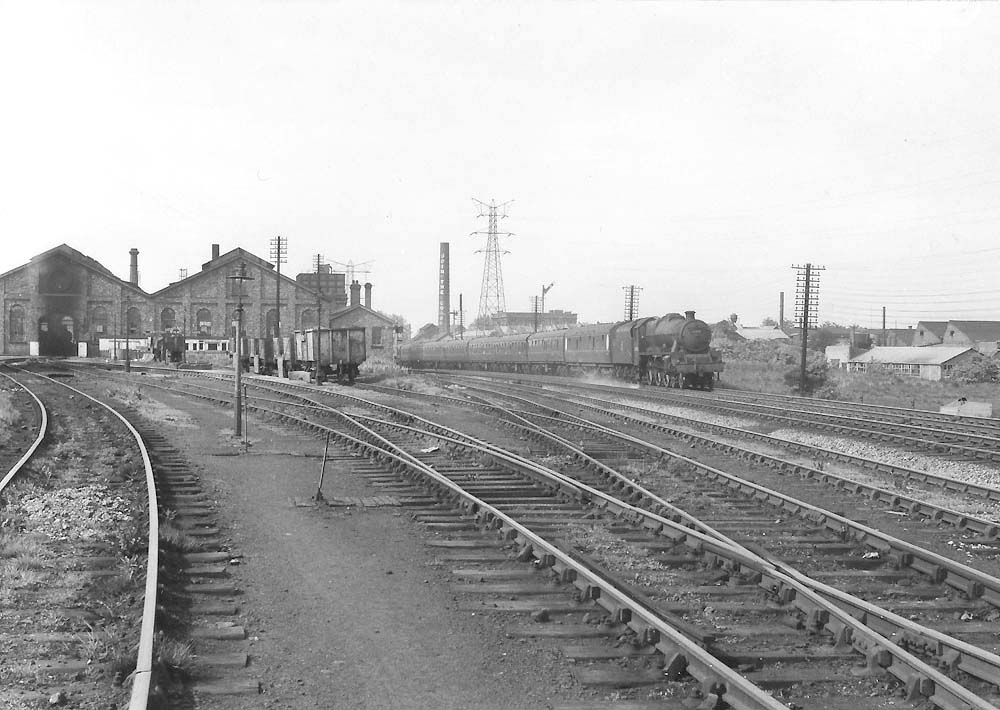 Ex-LMS 5XP 4-6-0 No 45690 Leander heading south past Bournville shed in an undated photo from the 1950s