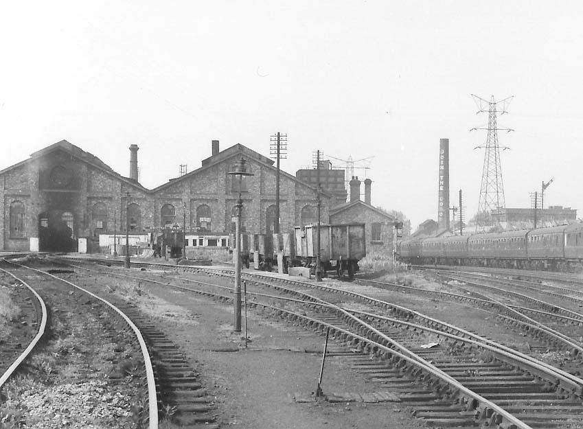 Close up showing the approach road to the roundhouses and the sidings storing wagons on the right