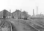 Close up showing the approach road to the roundhouses and the sidings storing wagons on the right