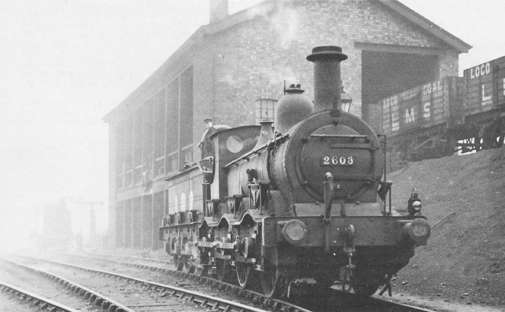 Ex-MR 2F 0-6-0 No 2603 photographed while taking on water at Bournville in March 1935