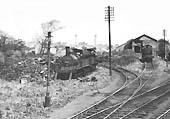 Close up of the coal stacks and coaling stage seen from a northbound train on Saturday 1st June 1957