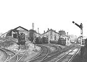 Close up showing a number of locomotives standing near to the roundhouse on Saturday 1st June 1957