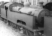 LMSR 3P 0-6-4T No 2015 stands with other engines in a siding alongside the shed at Bournville on Saturday 15th June 1935