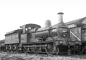 Ex-MR 2F 0-6-0 No 58167 is seen on a siding behind the coal stage at Bournville on 17th February 1957
