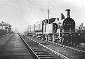MR 0-4-4T No 1324 heads an up local passenger train comprised of three six-wheel coaches and a clerestory