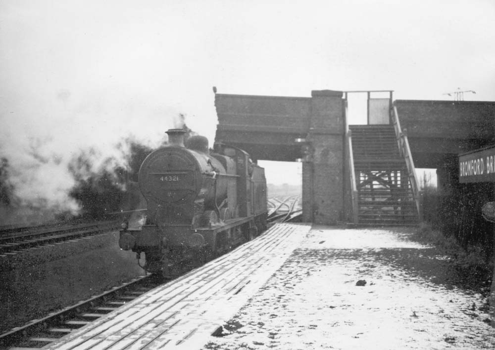 Ex-LMS 4F 0-6-0 No 44321 is held by signals whilst reversing into the sidings at Bromford Bridge in 1960