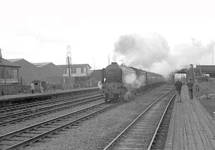 An unidentified ex-LNER A1 4-6-2 locomotive approaches the station on a York bound express in 1963