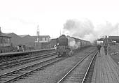 An unidentified ex-LNER A1 4-6-2 locomotive approaches the station on a York bound express in 1963