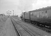 An unidentified ex-LNER A1 4-6-2 locomotive passes through the station on a York bound express in 1963