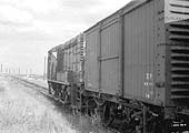 An unidentified Class 08 Diesel shunter is seen on Washwood Heath sidings headshunt circa 1966