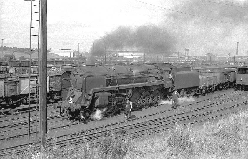 British Railways 2-10-0 Standard Class 9F No 92223 is seen standing between Bromford Bridge and Washwood Heath sidings circa 1966