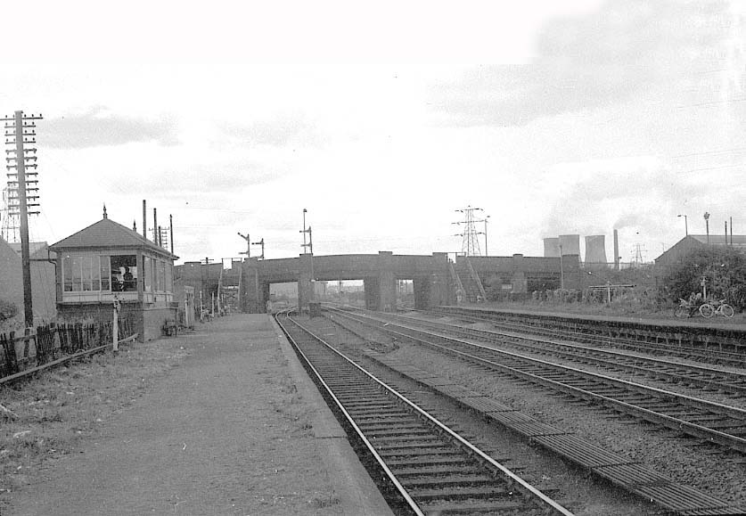 Looking along the station's down platform with the LMS Signal Box on the left and the up platform on the right