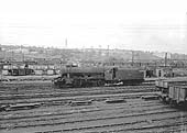 Ex-LMS 8F 2-8-0 No 48220 drifts slowly light engine through Washwood Heath extensive sidings