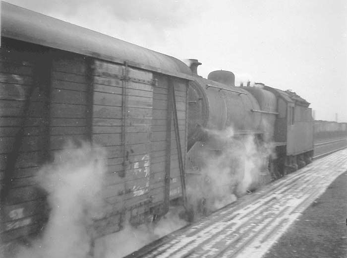 An unidentified ex-LMS 6P5F 2-6-0 'Horwich Crab' runs tender first and wrong line through Bromford Bridge's up platform
