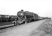 Ex-LMS 8F 2-8-0 No 48545 passing through Bromford Bridge Station at the head of a down Type 7 service