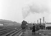 Ex-LMS 8F 2-8-0 No 48117 approaches Bromford Bridge Racecourse station on a down Type 7 Express freight service
