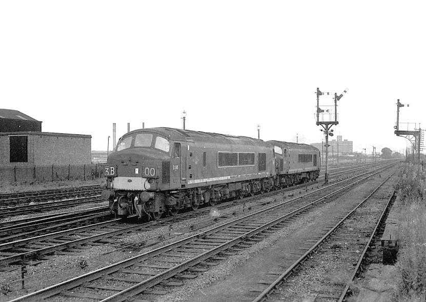 Two unidentified Sulzer Type 4 locomotives running 'light engine' approach Bromford Bridge's horse dock
