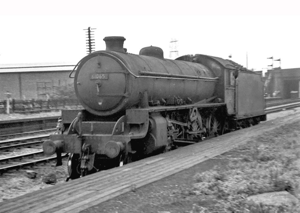 Ex-LNER B1 4-6-0 No 61065 passes through Bromford Bridge light engine on the up slow line
