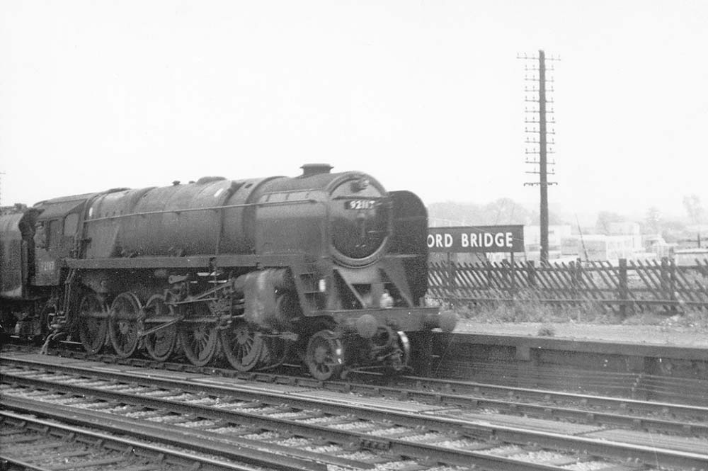 British Railways 9F 2-10-0 No 92117 passes through Bromford Bridge with a Class H through freight service