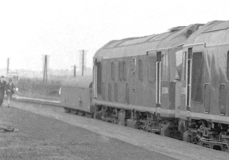Close up showing the front of the pair of diesels standing at Bromford Bridge with a brake tender coupled to the front of the locomotives
