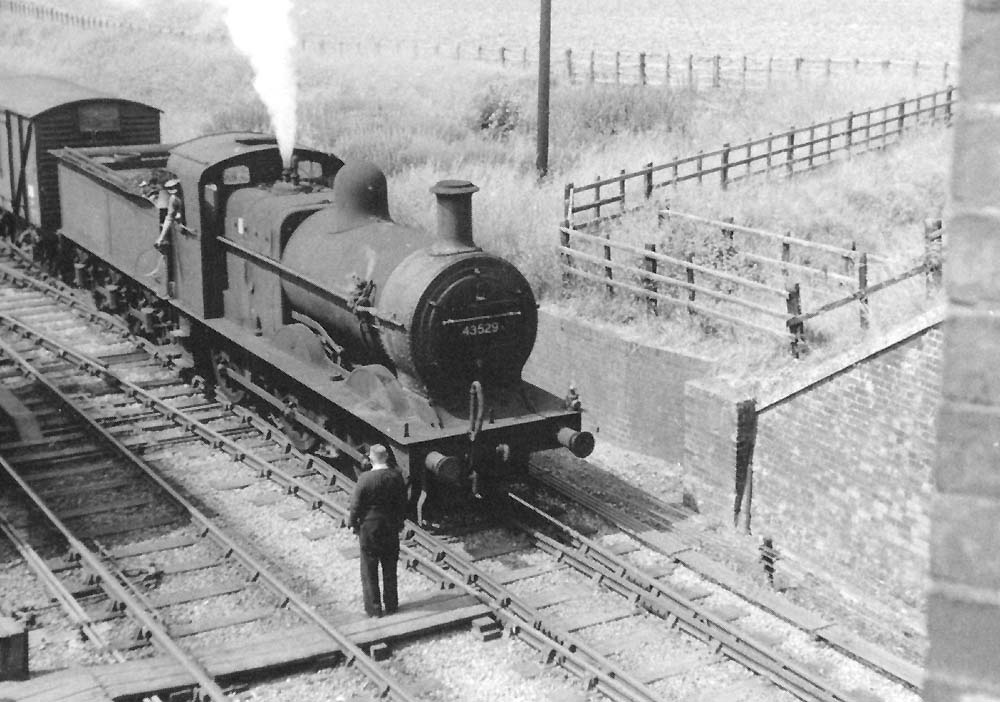 Ex-MR 0-6-0 3F No 43529 at the head of a stopping freight train from Evesham to Washwood Heath sidings on 14th June 1961