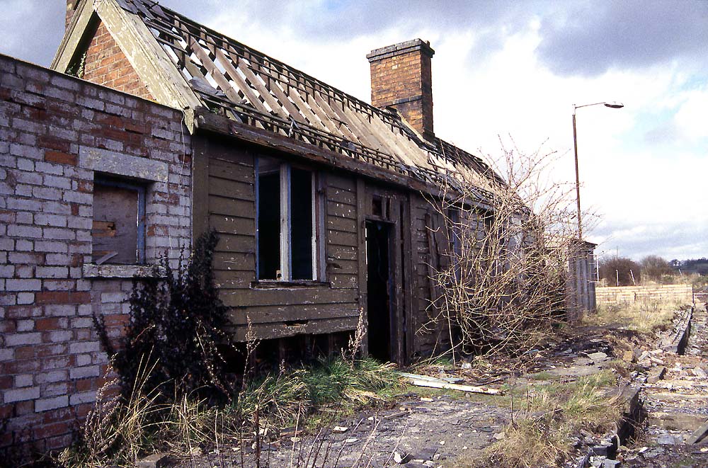 In this view looking towards Redditch, the basic structure can be seen, brick gable walls, timber framed and clad front and rear elevations