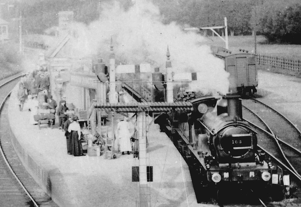 Close up of  passengers waiting on Broom Junction's platform for a SMJ train to arrive to take them forward to Stratford upon Avon