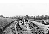 A panoramic view of Broom Junction station looking towards Redditch on a quiet day with no passengers visible