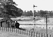 Close up of  an ex-LMS 4F 0-6-0 standing at the head of a Stratford upon Avon train waiting for the right of way