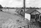 Broom North signal box with the signalman re-entering his box after exchanging the tokens