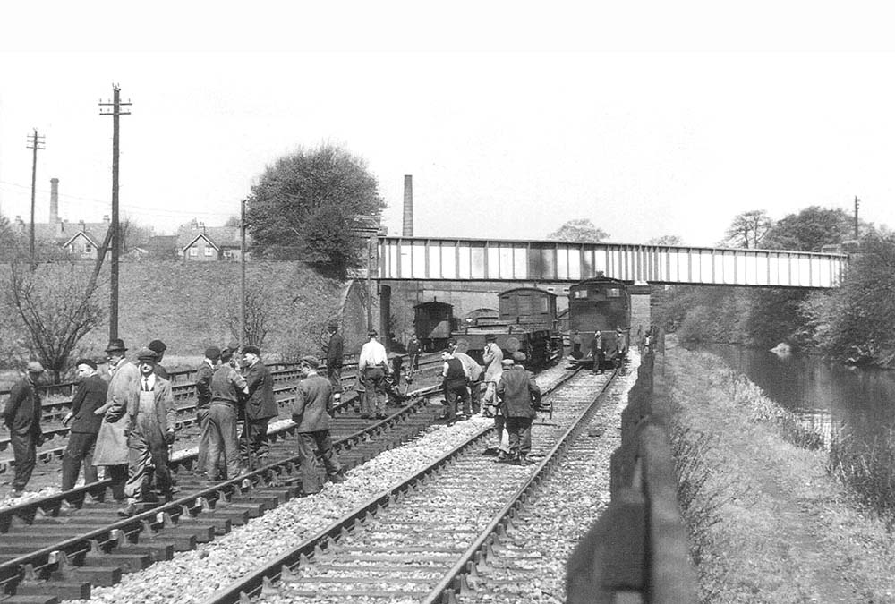A gang of Permanent Way men are seen replacing track adjacent to Cadbury's exchange sidings on 3rd May 1953