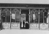 Close up showing the ornate screen to the concourse booking hall and general waiting room