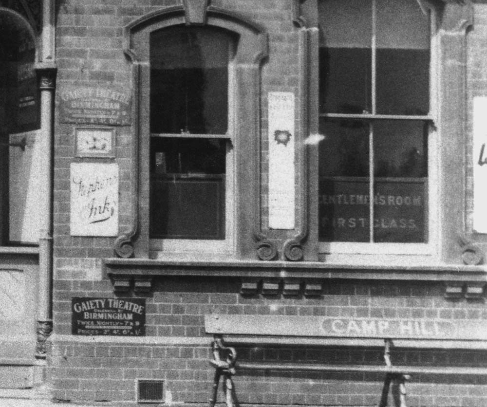 Close up showing Camp Hill station's First Class Gentlemen's Room with a MR bench seat with the station's name incorporated on the back support