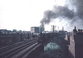 View of ex-MR 0-6-0 4F No 43926 at the head of a down goods train approaching Camp Hill Signal Box