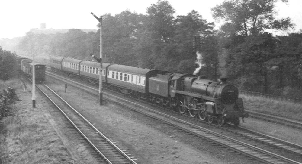 British Railways Standard Class 5MT 4-6-0 No 73003 approaches the station from Washwood Heath on an up express service in 1953