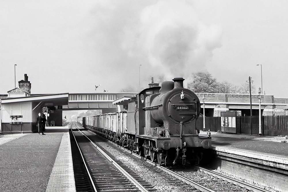 Ex-LMS 4F 0-6-0 No 44562 passes through Castle Bromwich with an East bound freight on 4th May 1963