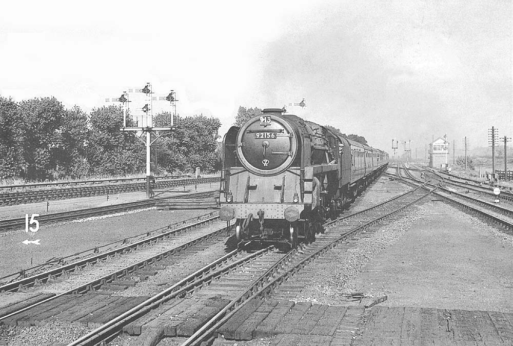 BR Standard 9F 2-10-0 No 92156 approaches Castle Bromwich with an express service on 5th September 1957