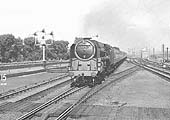 BR Standard 9F 2-10-0 No 92156 approaches Castle Bromwich with an express service on 5th September 1957