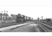 British Railways B1 4-6-0 No 61318 passes Castle Bromwich signal box with the daily Cleethorpes to New Street service on 7th July 1962