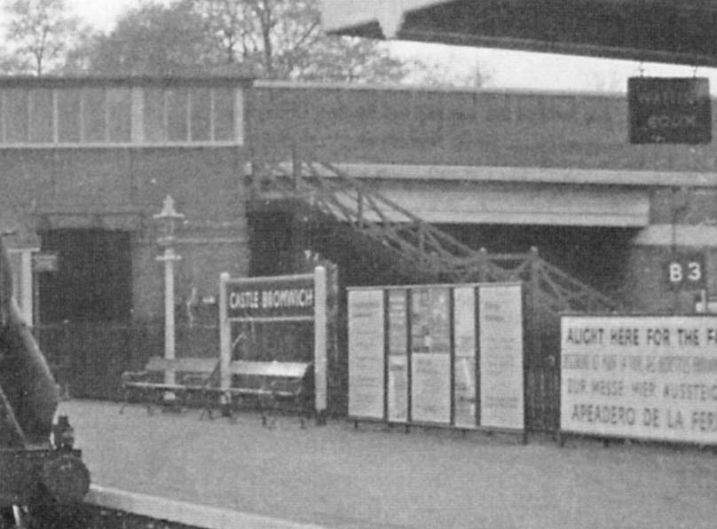 Close up showing part of the covered stairs onto the down platform and on the right open steps to the sidings