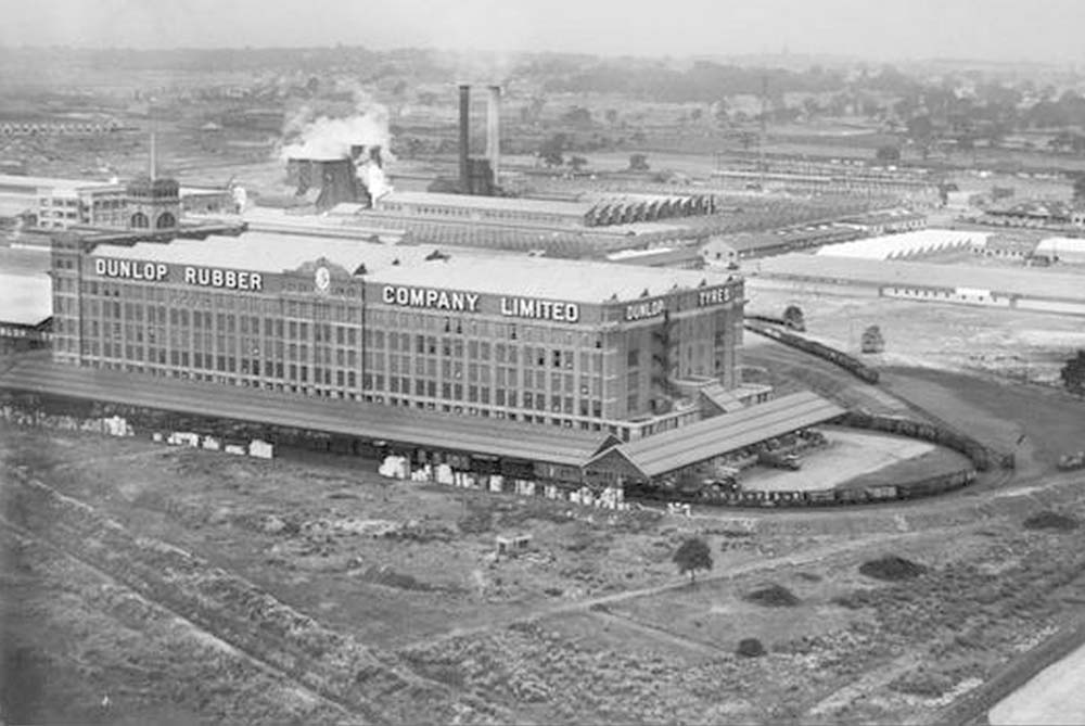 Second of five aerial photographs showing the Fort Dunlop factory and sidings together with the adjacent railway