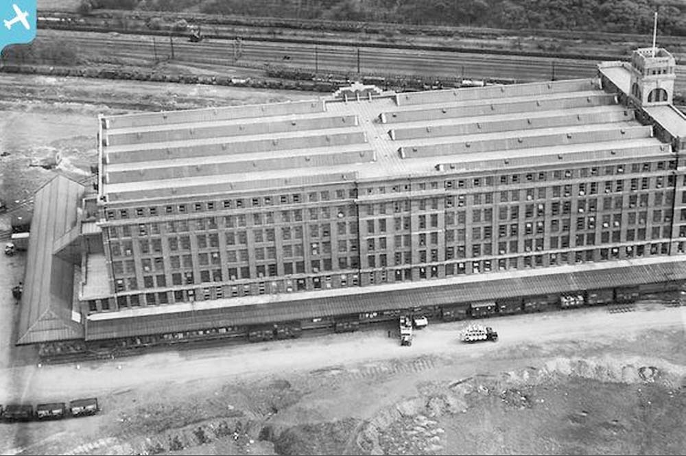 Third of five aerial photographs showing the Fort Dunlop factory and sidings together with the adjacent railway