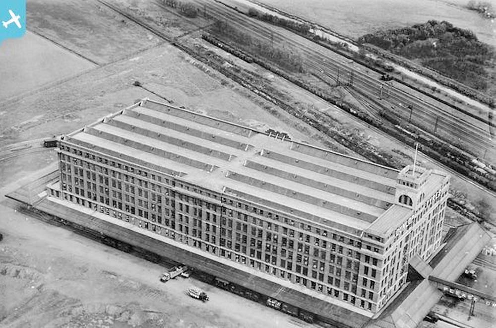 Fourth of five aerial photographs showing the Fort Dunlop factory and sidings together with the adjacent railway